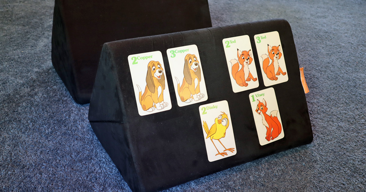 Nugget couch hack used as a kids card holder and game stand
