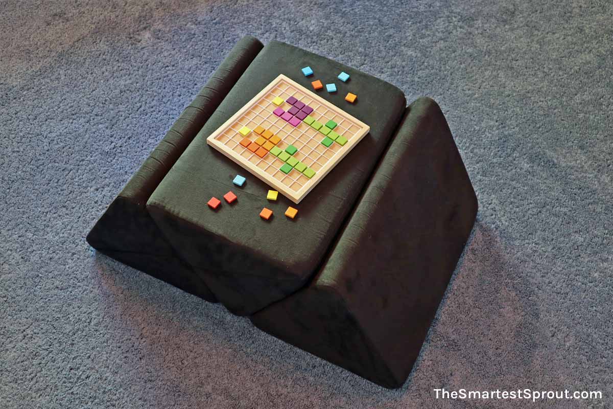 Nugget couch cushions used to raise board game surface like a small table